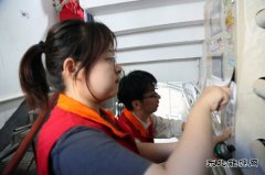 国网佳木斯供电公司：治理城市“牛皮癣” 美化环境“靓”社区